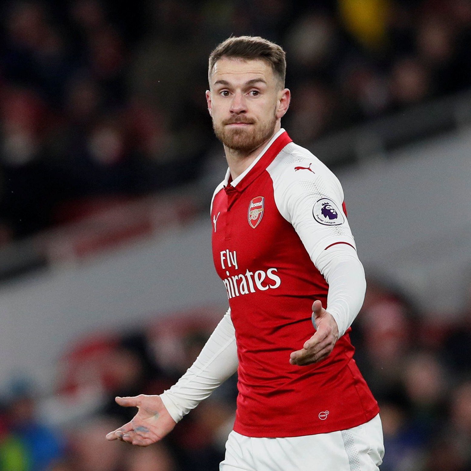 Aaron Ramsey, jogador de futebol galês, usando a camisa do Arsenal em partida pelo clube de Londres onde jogou a maior parte da carreira.